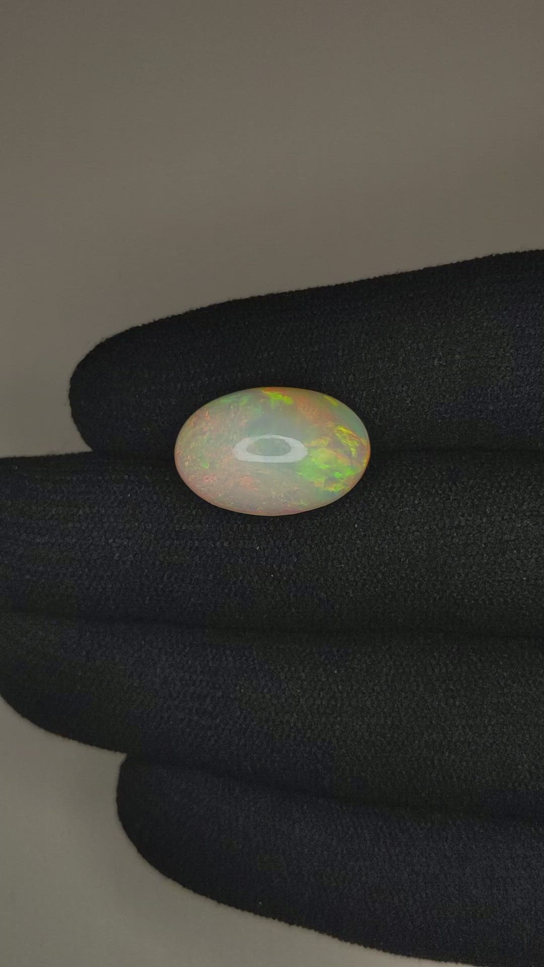 7.02 Ct. Multi Color Cabochon White Opal from Ethiopia Size Video