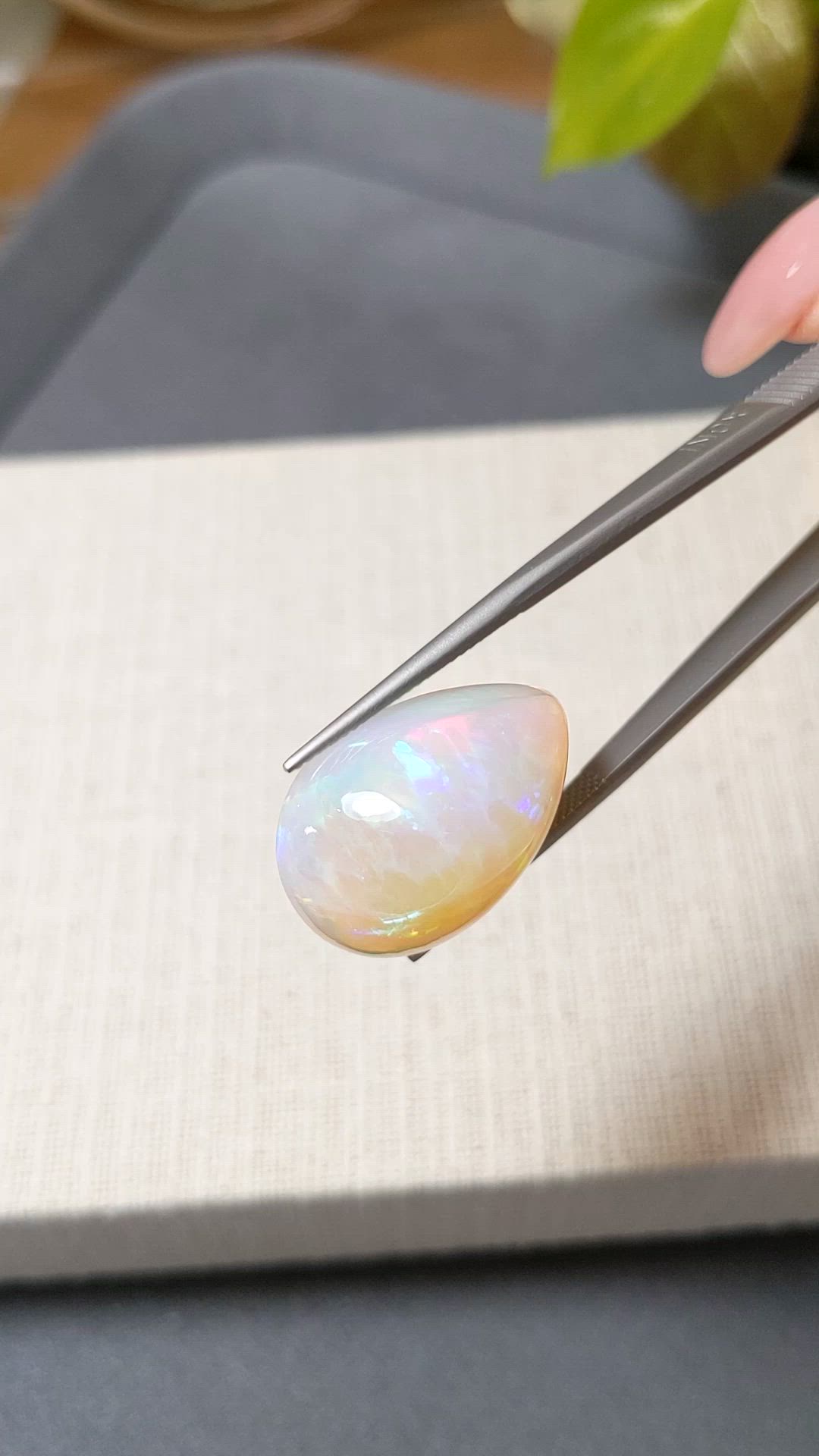 22.46 Ct. Multi Color Cabochon White Opal from Ethiopia Size Video