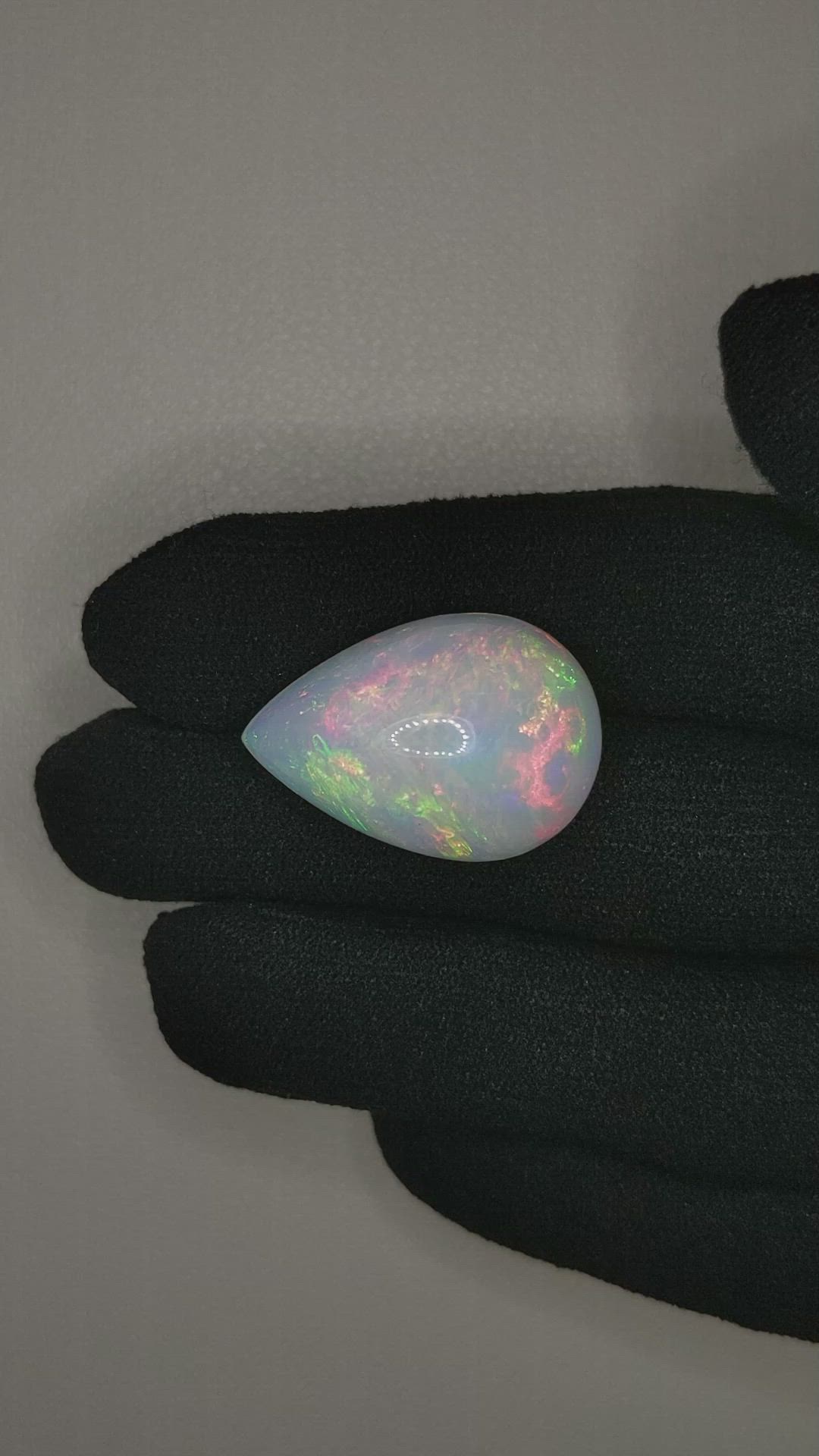 20.51 Ct. Multi Color Cabochon White Opal from Ethiopia Size Video