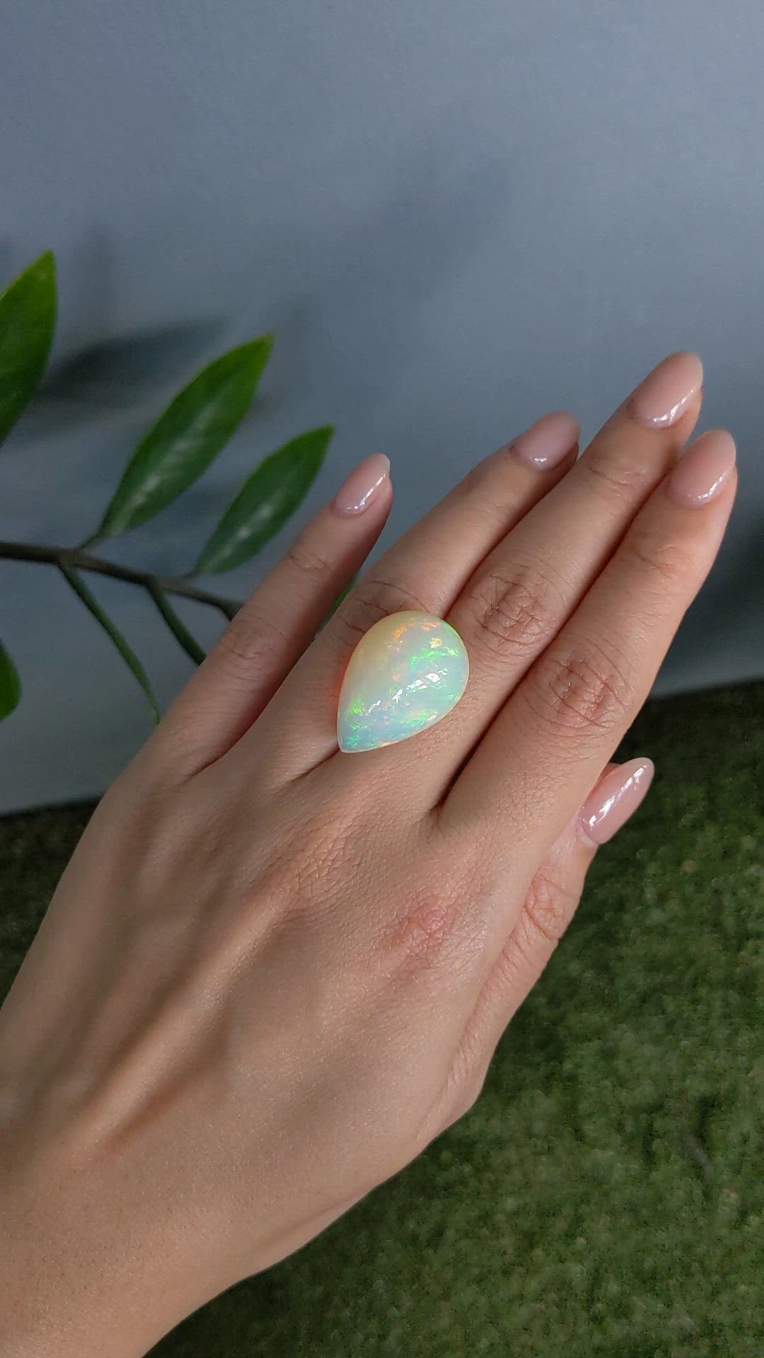 20.51 Ct. Multi Color Cabochon White Opal from Ethiopia Size Video