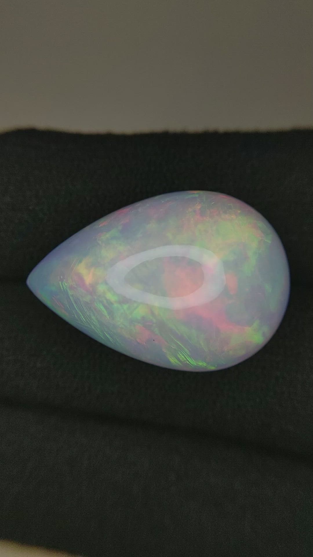 20.51 Ct. Multi Color Cabochon White Opal from Ethiopia Size Video