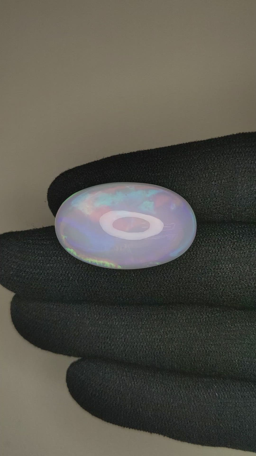 23.91 Ct. Multi Color Cabochon White Opal from Ethiopia Size Video