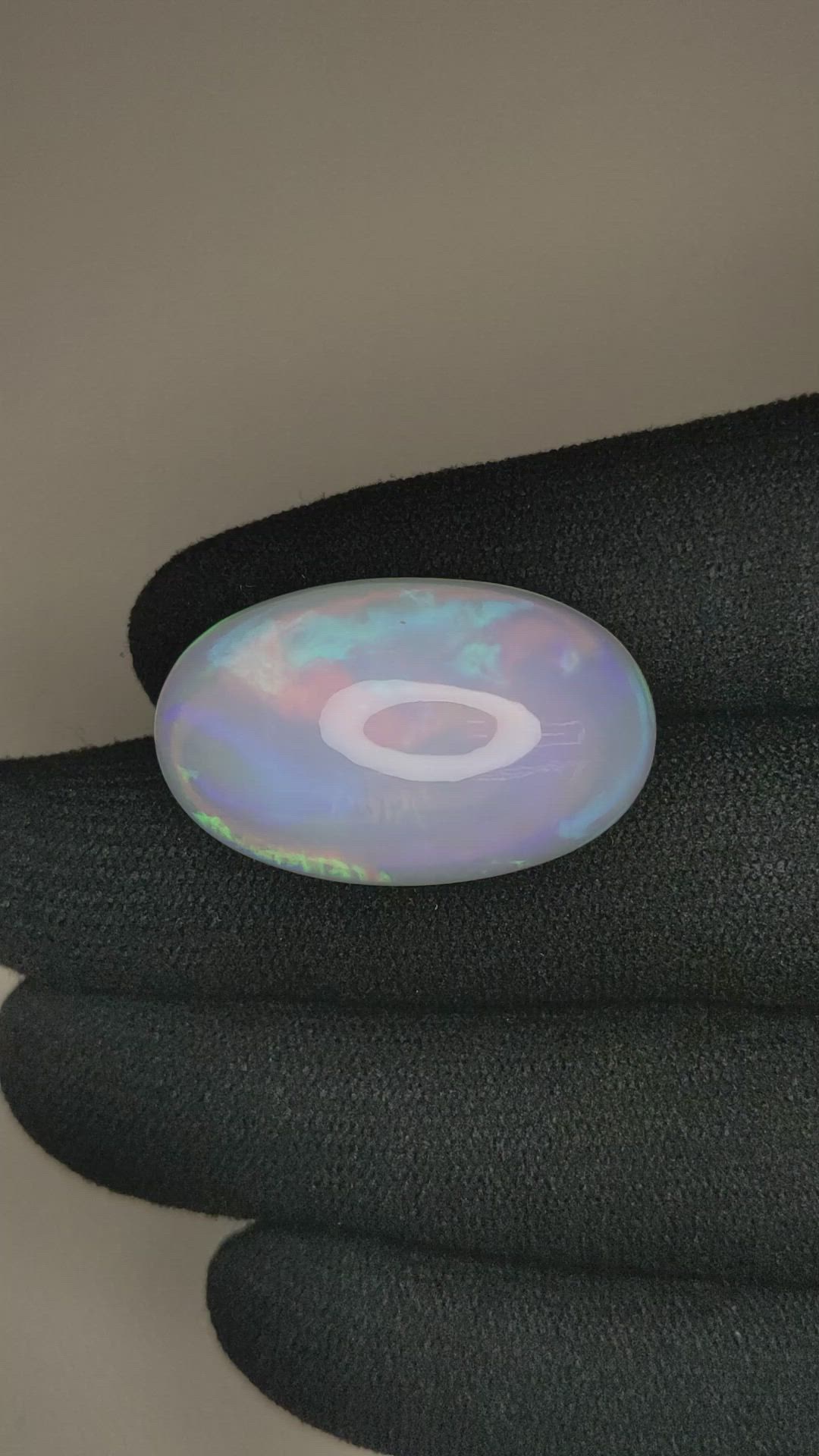23.91 Ct. Multi Color Cabochon White Opal from Ethiopia Size Video