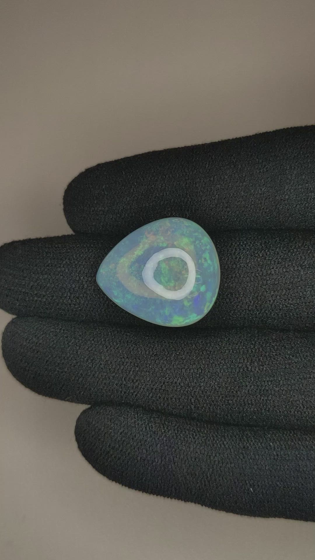 17.68 Ct. Multi Color Cabochon White Opal from Ethiopia Size Video