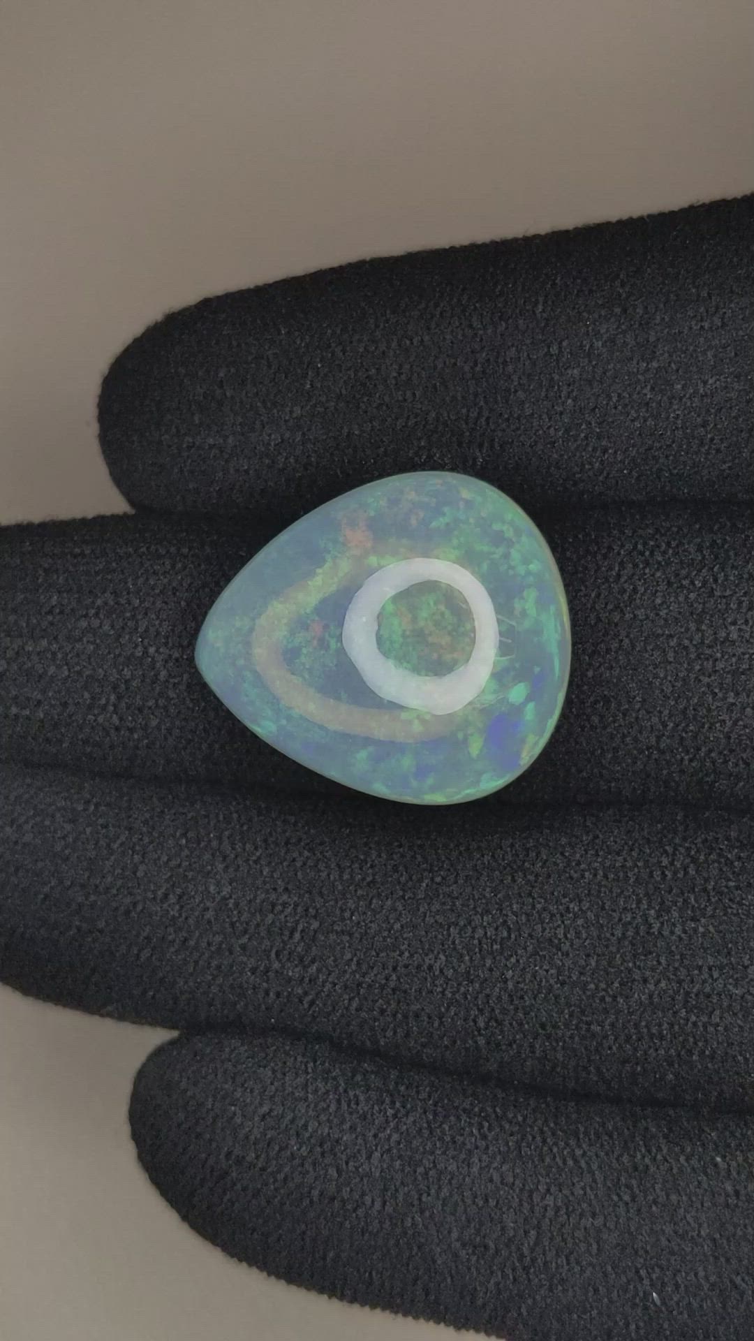 17.68 Ct. Multi Color Cabochon White Opal from Ethiopia Size Video