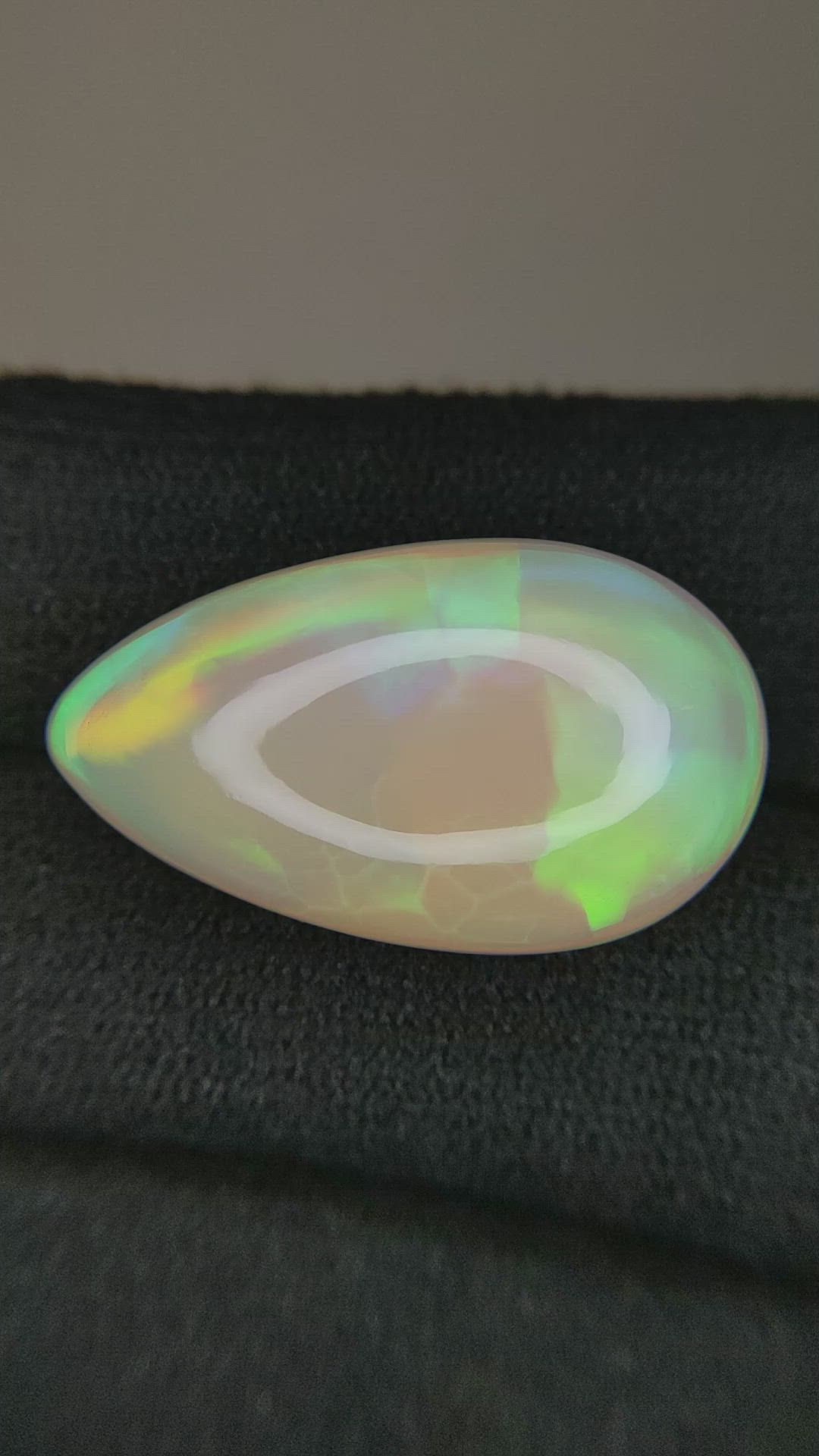 17.22 Ct. Multi Color Cabochon White Opal from Ethiopia Size Video