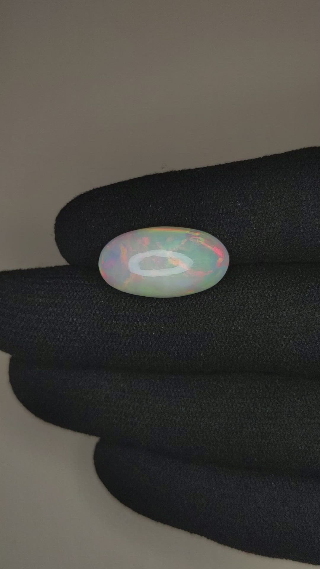 6.77 Ct. Multi Color Cabochon White Opal from Ethiopia Size Video