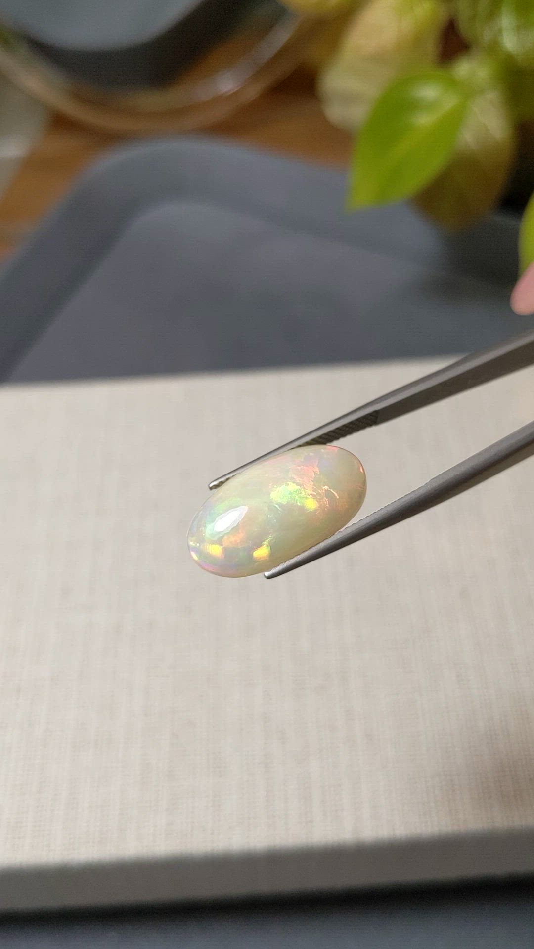 6.77 Ct. Multi Color Cabochon White Opal from Ethiopia Size Video