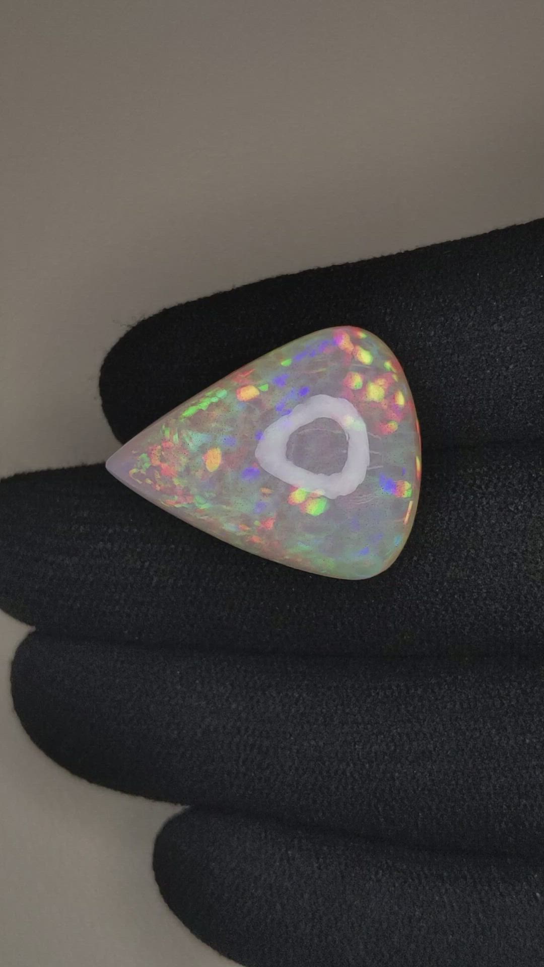 22.15 Ct. Multi Color White Opal from Ethiopia Size Video