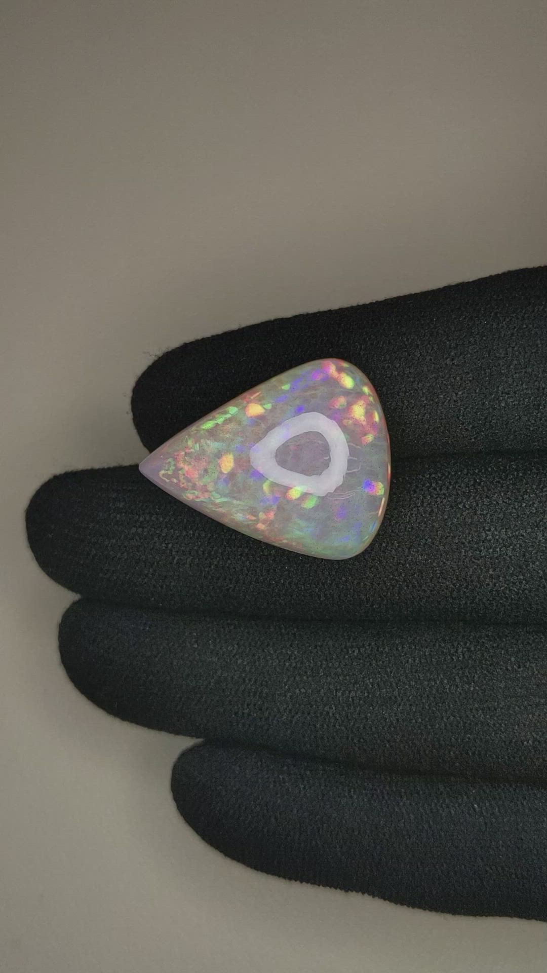 22.15 Ct. Multi Color White Opal from Ethiopia Size Video