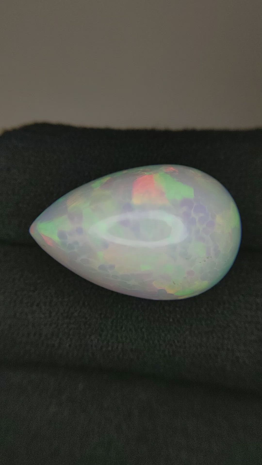 16.98 Ct. Multi Color Cabochon White Opal from Ethiopia Size Video