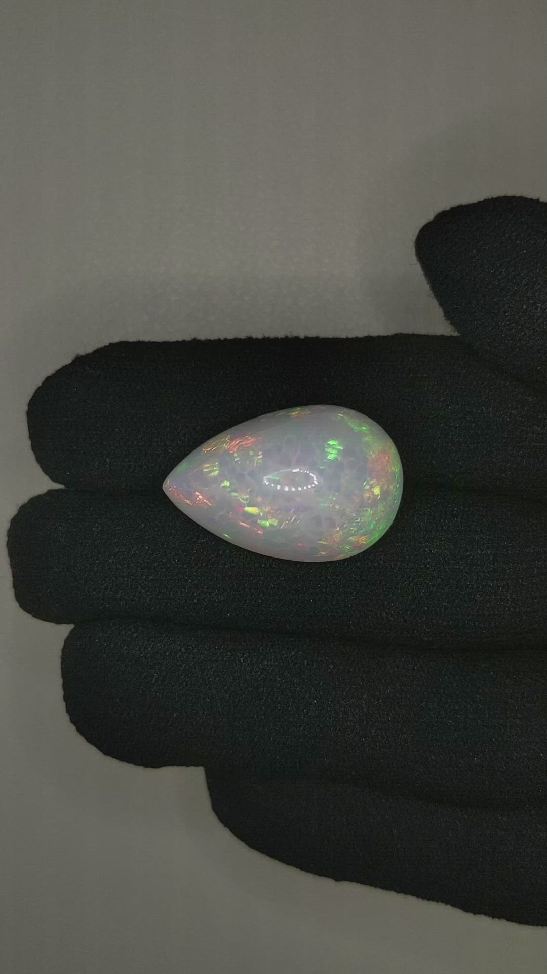 16.98 Ct. Multi Color Cabochon White Opal from Ethiopia Size Video
