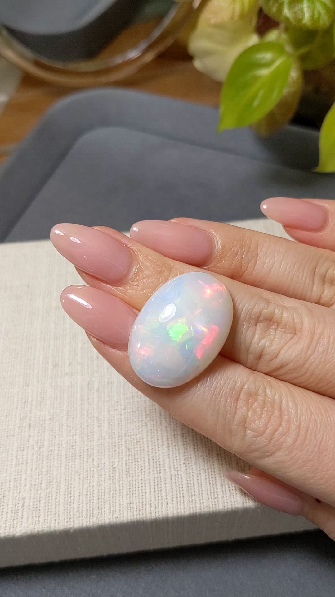 20.97 Ct. Multi Color Cabochon White Opal from Ethiopia Size Video