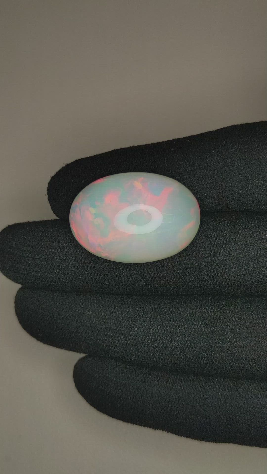 20.97 Ct. Multi Color Cabochon White Opal from Ethiopia Size Video