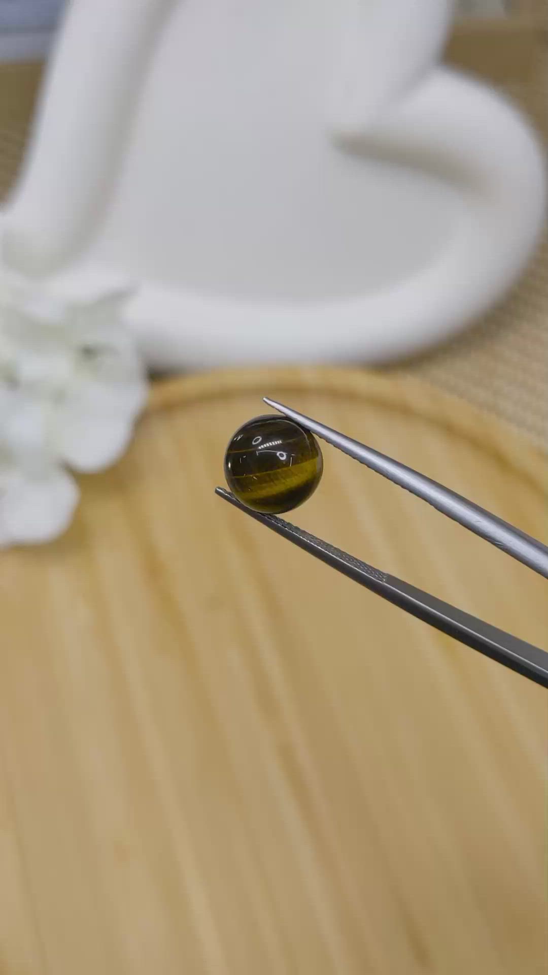 4.34 Ct. Cabochon Tiger's Eye from Ceylon (Sri Lanka) Size Video