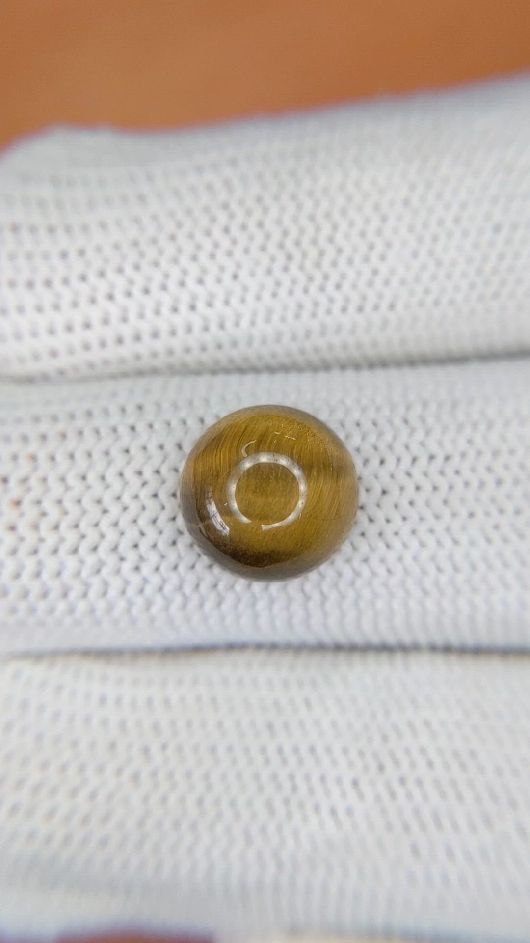 4.39 Ct. Cabochon Tiger's Eye from Ceylon (Sri Lanka) Size Video