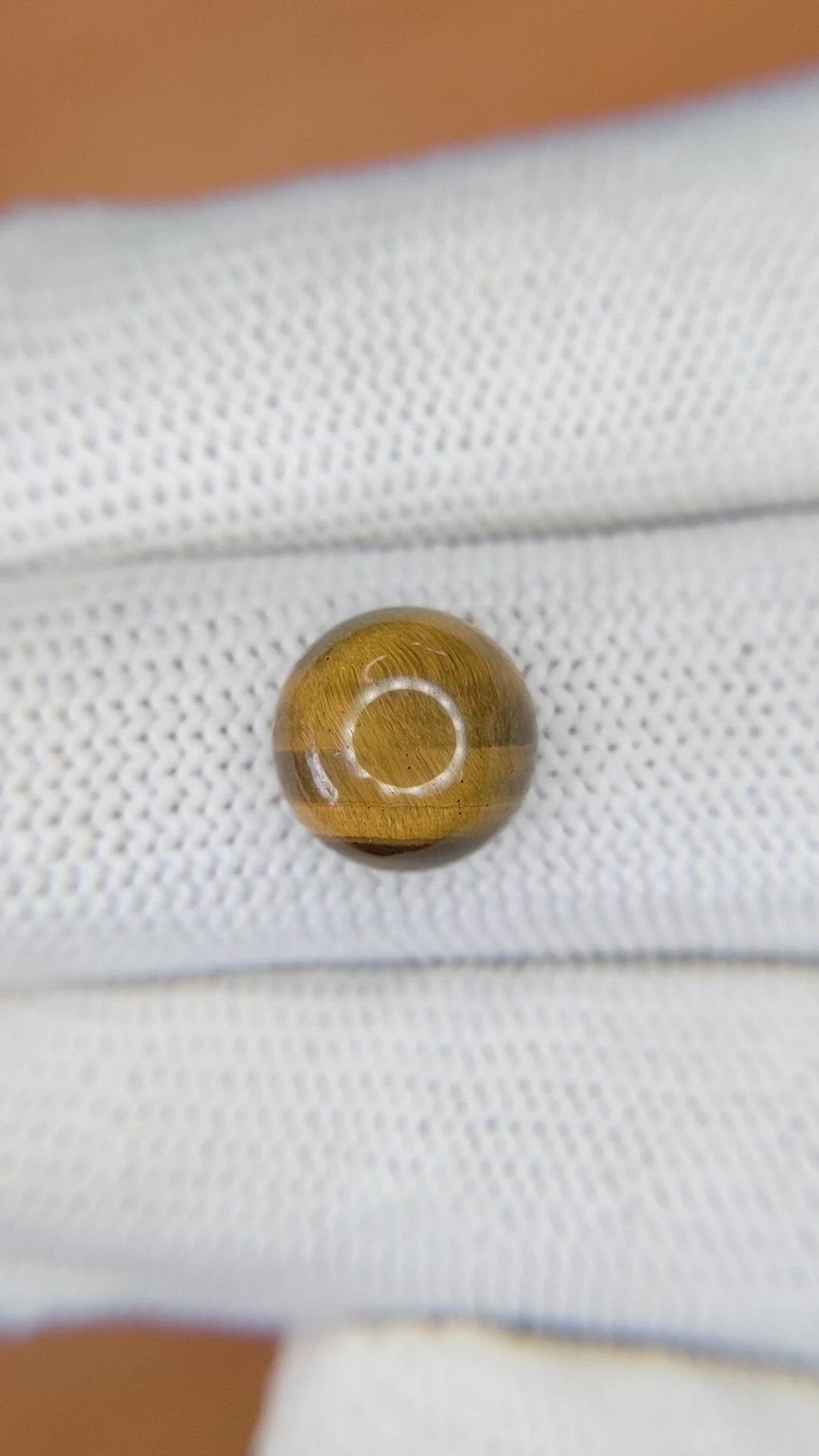 4.53 Ct. Cabochon Tiger's Eye from Ceylon (Sri Lanka) Size Video