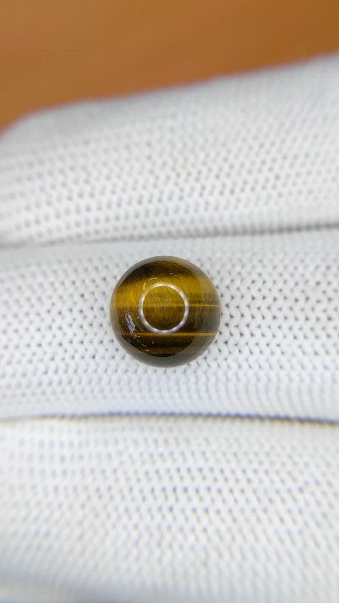 4.33 Ct. Cabochon Tiger's Eye from Ceylon (Sri Lanka) Size Video