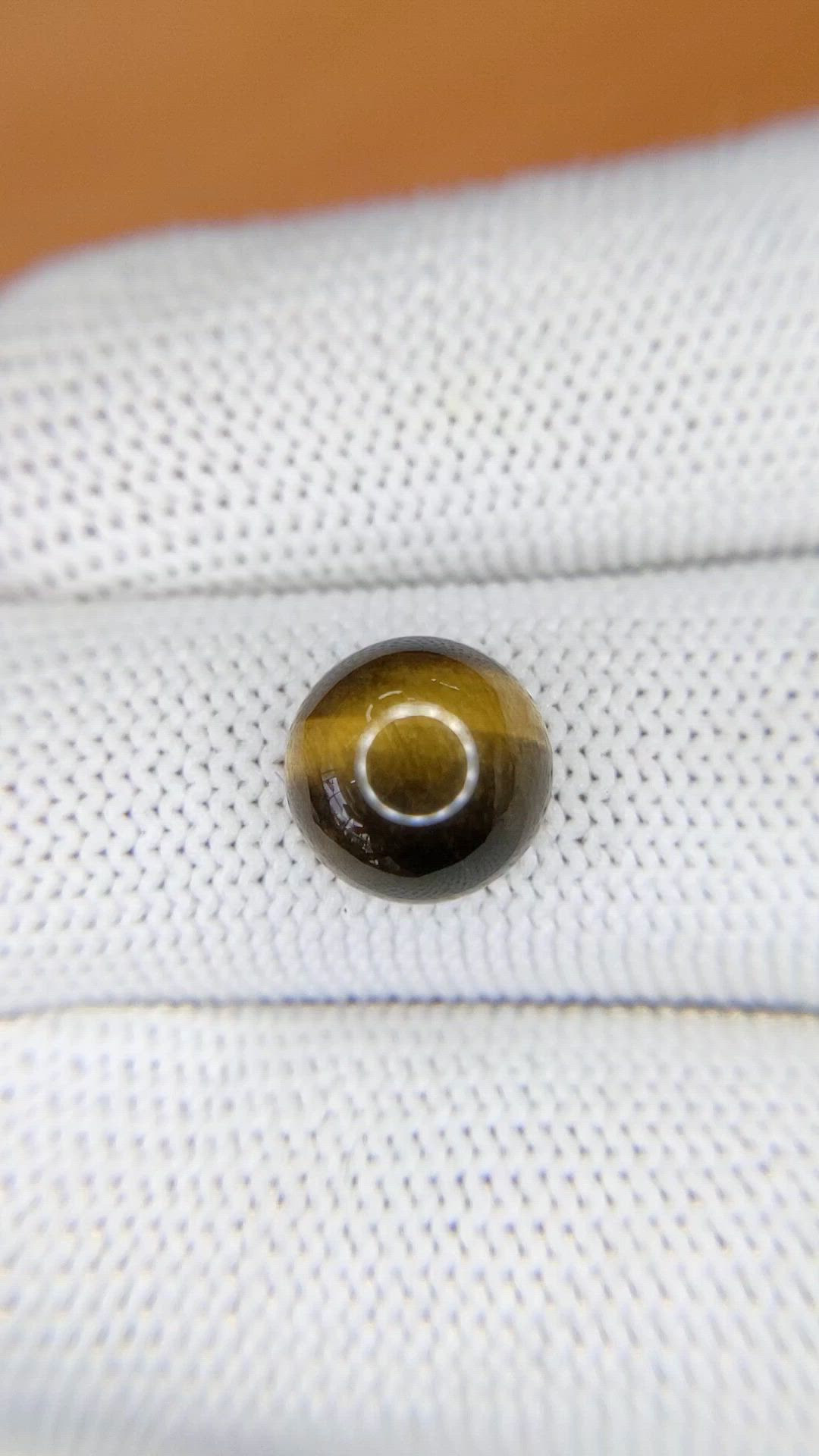 4.43 Ct. Cabochon Tiger's Eye from Ceylon (Sri Lanka) Size Video