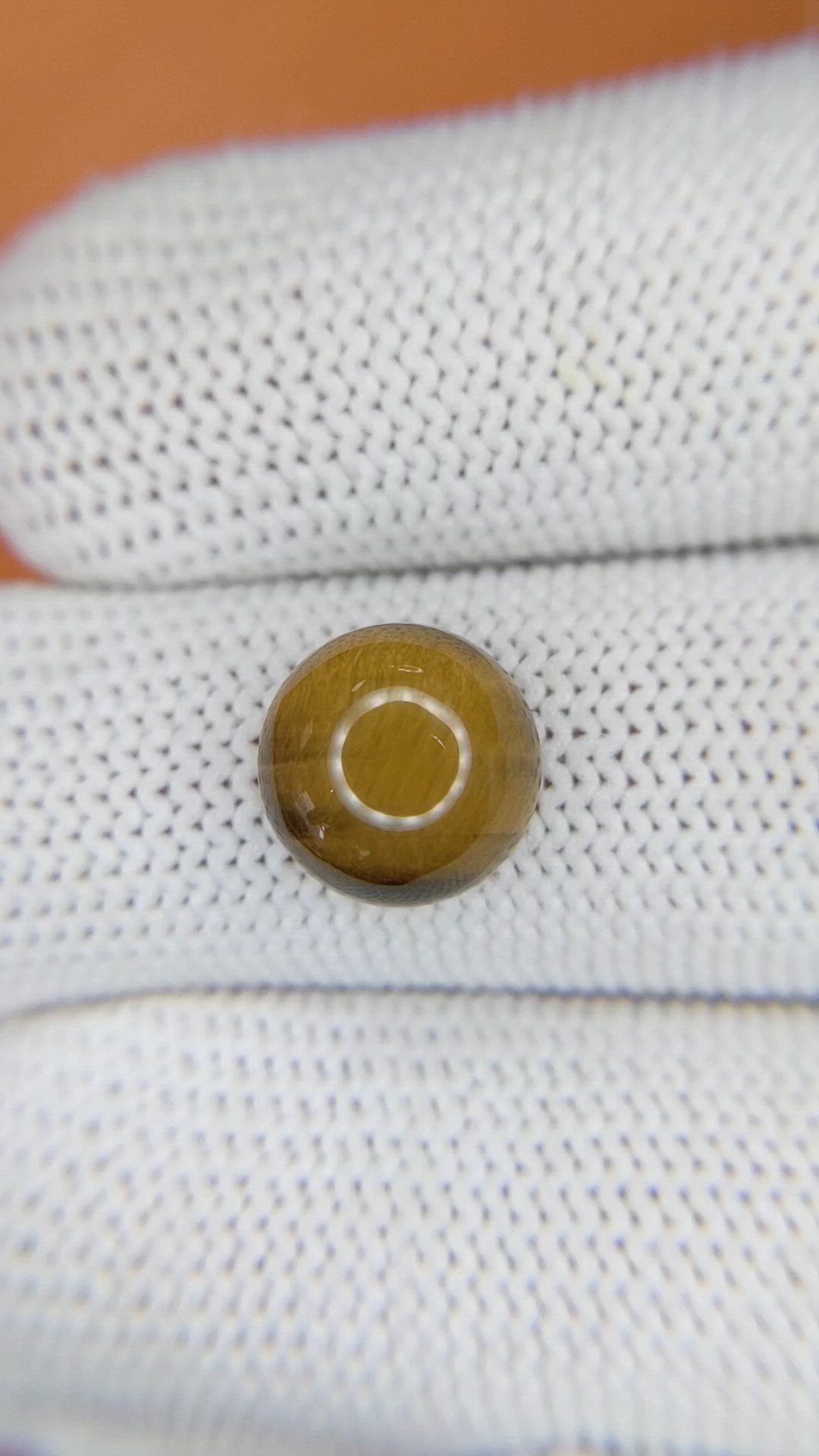 4.37 Ct. Cabochon Tiger's Eye from Ceylon (Sri Lanka) Size Video