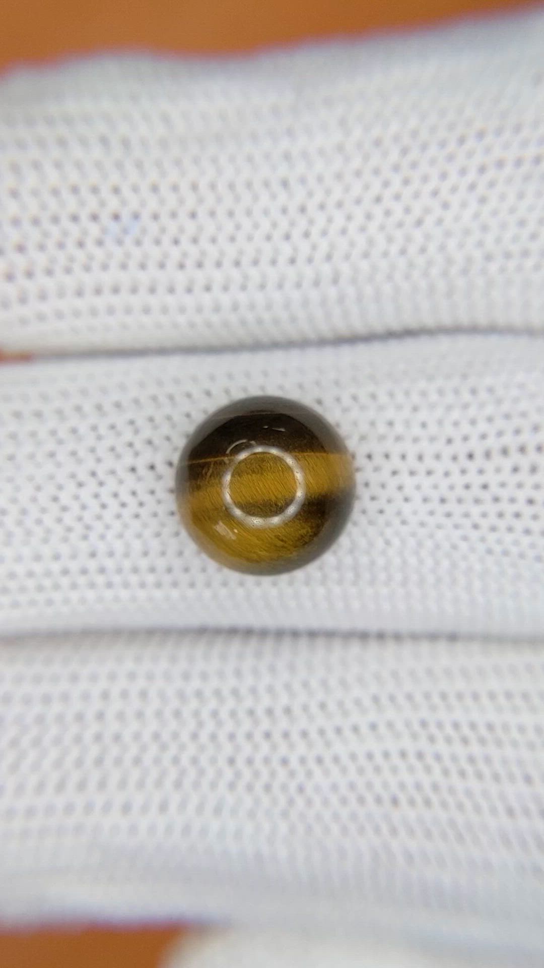 4.48 Ct. Cabochon Tiger's Eye from Ceylon (Sri Lanka) Size Video