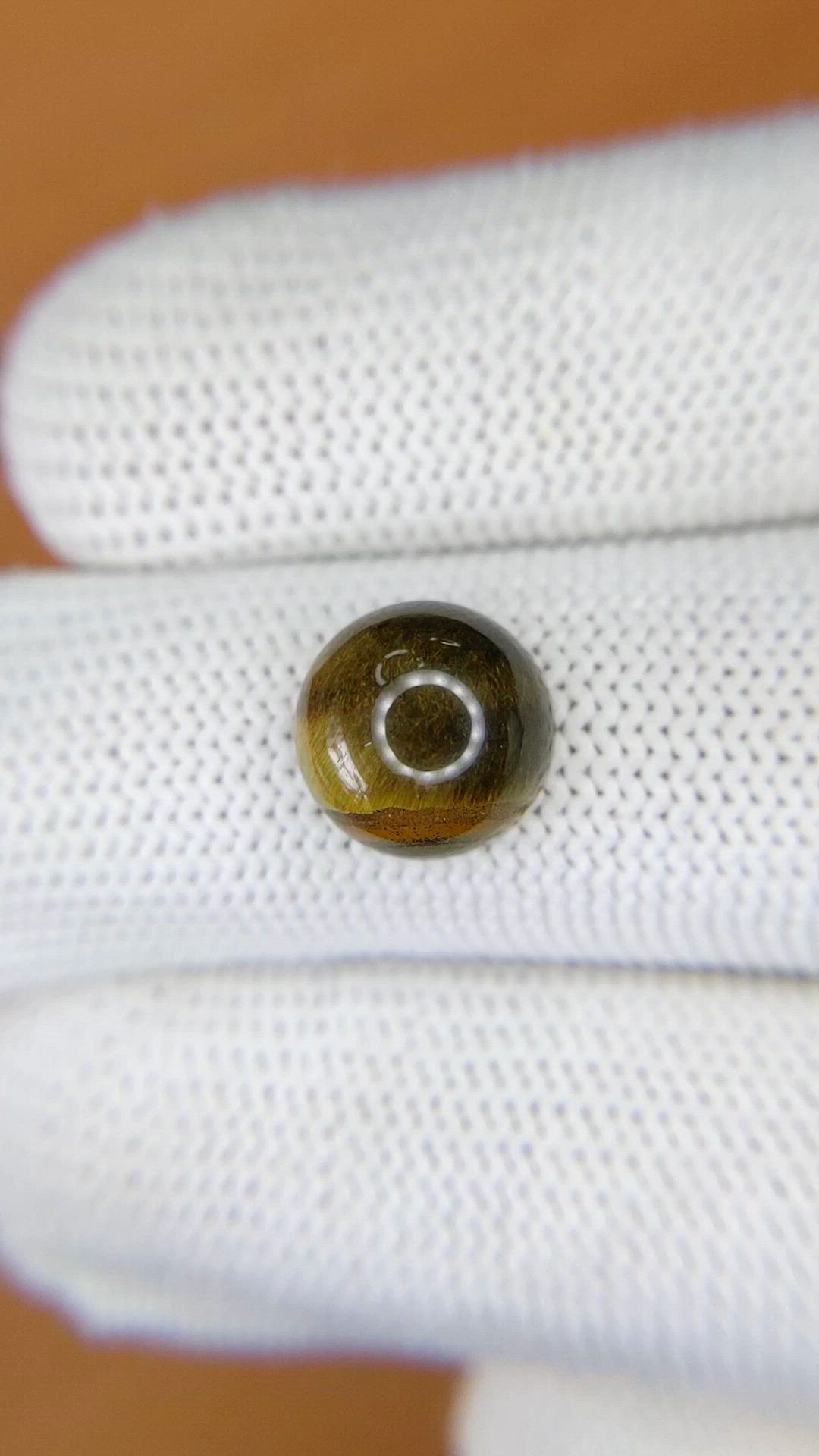 4.28 Ct. Cabochon Tiger's Eye from Ceylon (Sri Lanka) Size Video