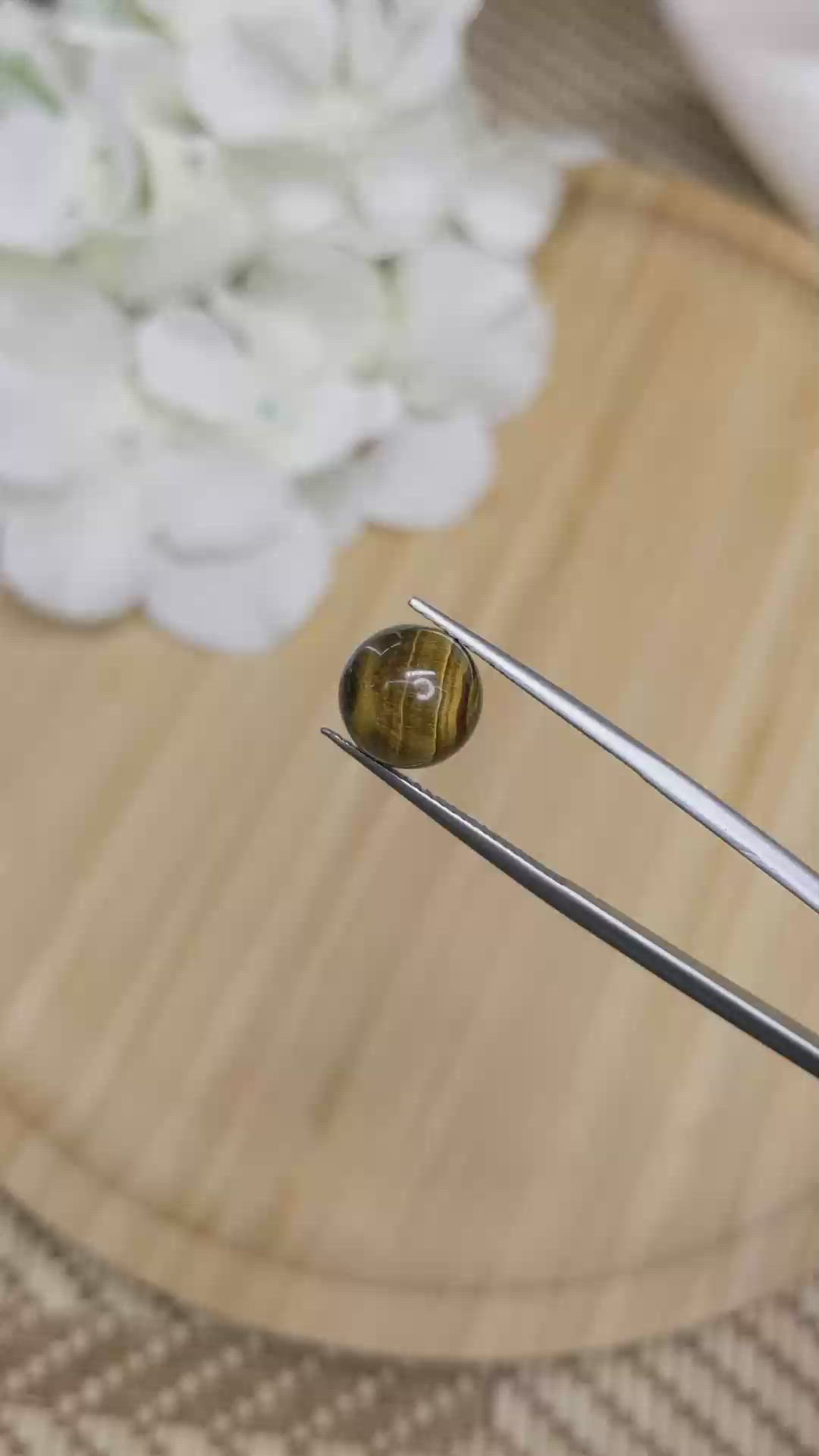 4.41 Ct. Cabochon Tiger's Eye from Ceylon (Sri Lanka) Size Video