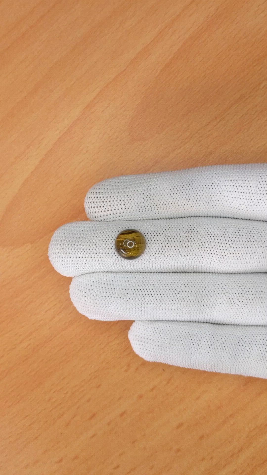 4.41 Ct. Cabochon Tiger's Eye from Ceylon (Sri Lanka) Size Video