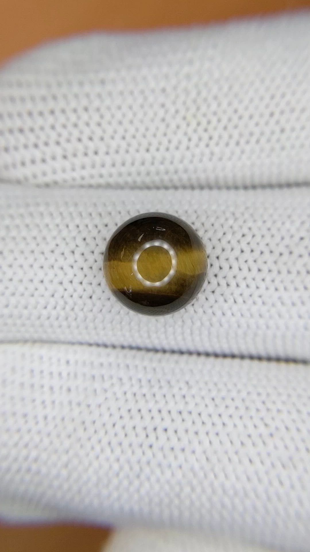 4.27 Ct. Cabochon Tiger's Eye from Ceylon (Sri Lanka) Size Video