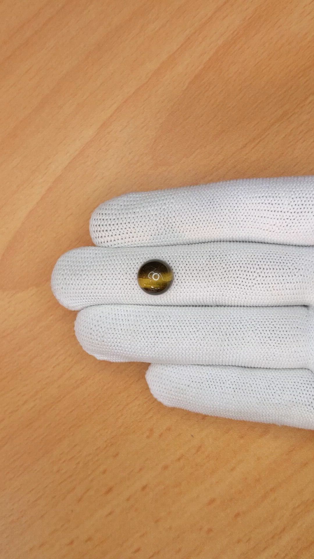 4.27 Ct. Cabochon Tiger's Eye from Ceylon (Sri Lanka) Size Video