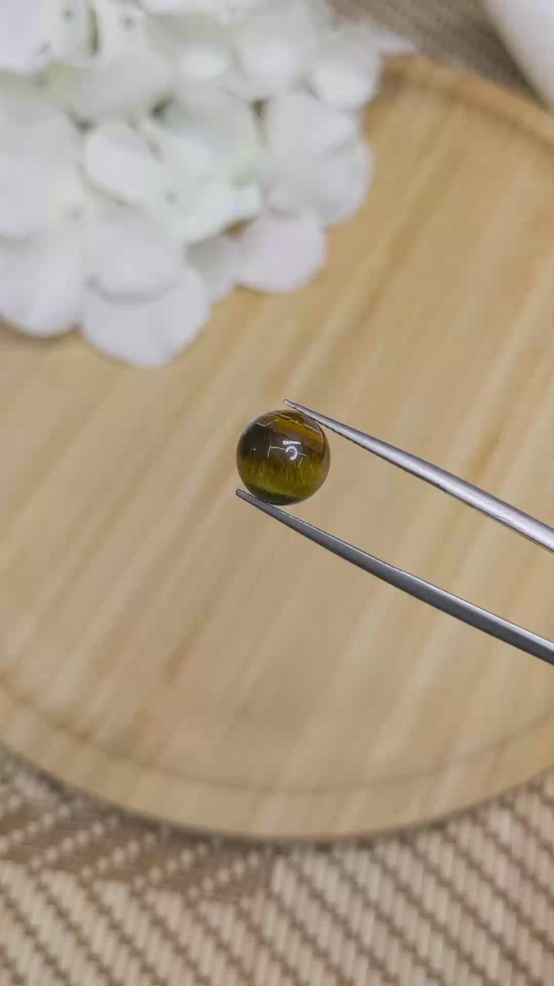 4.47 Ct. Cabochon Tiger's Eye from Ceylon (Sri Lanka) Size Video