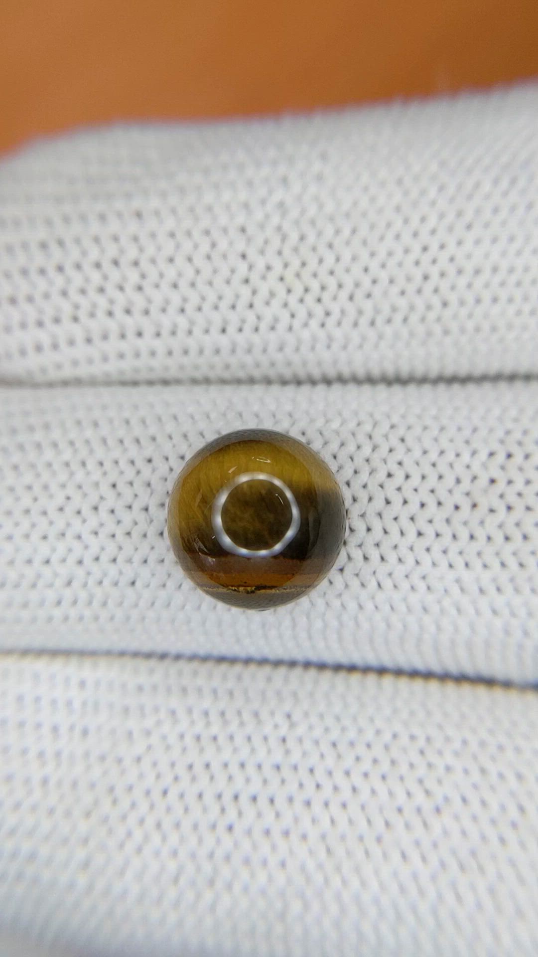 4.47 Ct. Cabochon Tiger's Eye from Ceylon (Sri Lanka) Size Video