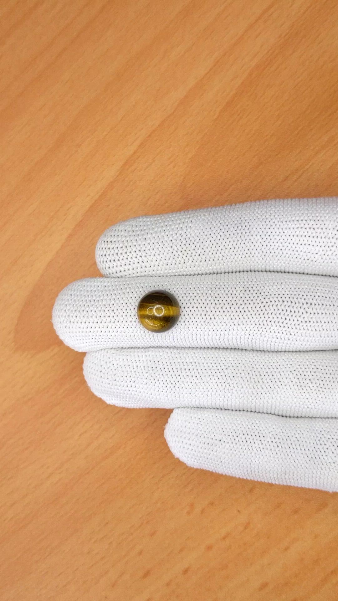 4.37 Ct. Cabochon Tiger's Eye from Ceylon (Sri Lanka) Size Video
