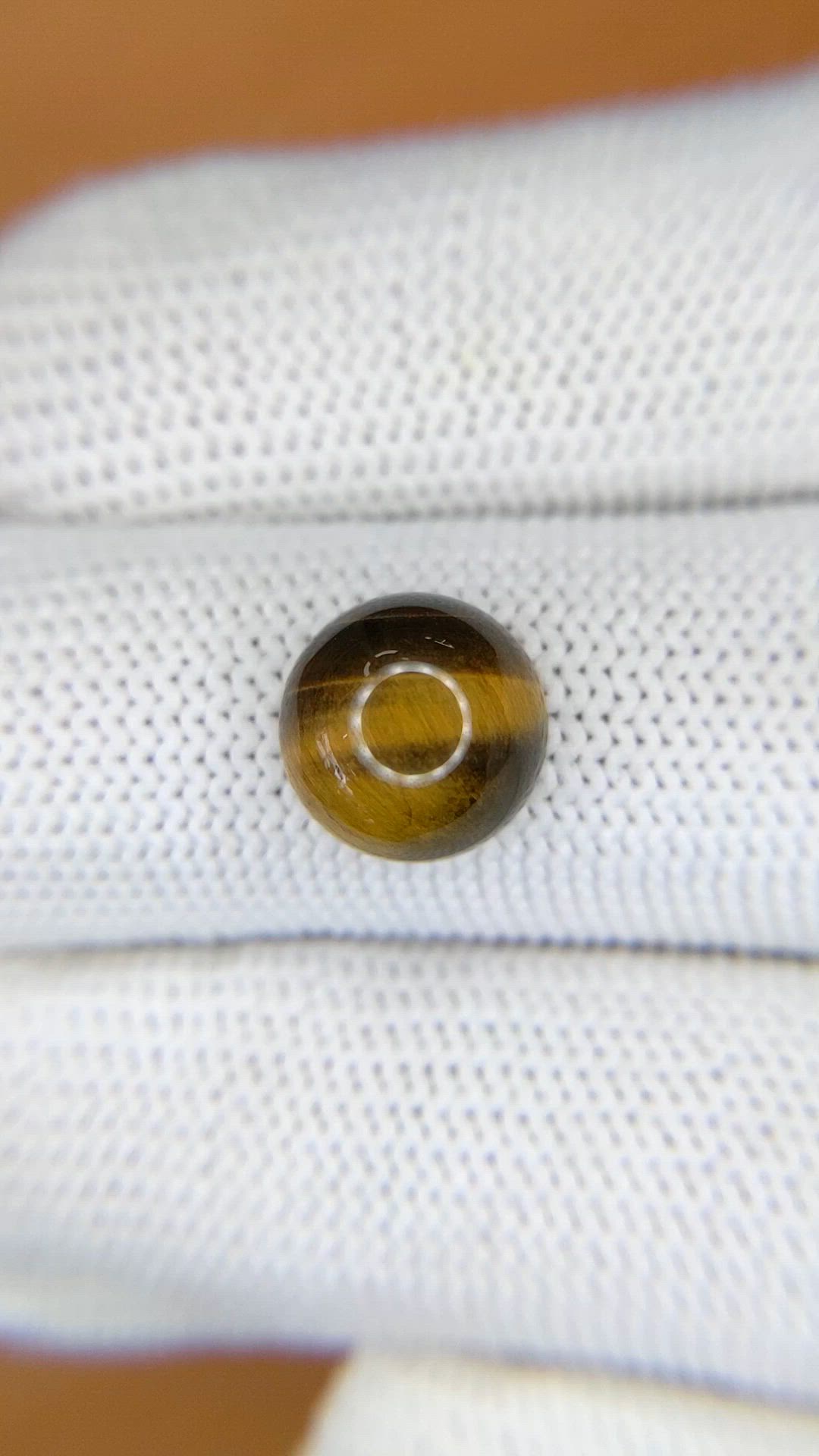 4.37 Ct. Cabochon Tiger's Eye from Ceylon (Sri Lanka) Size Video