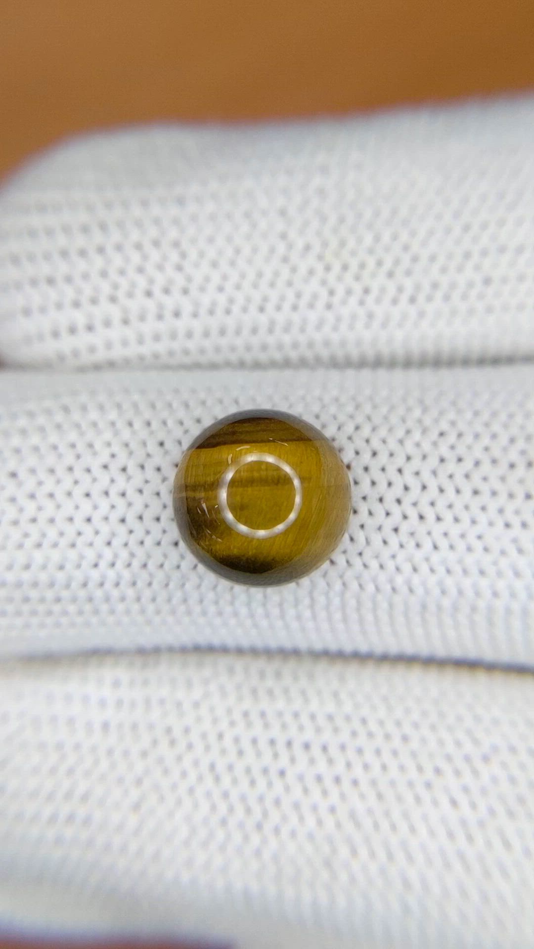 4.26 Ct. Cabochon Tiger's Eye from Ceylon (Sri Lanka) Size Video