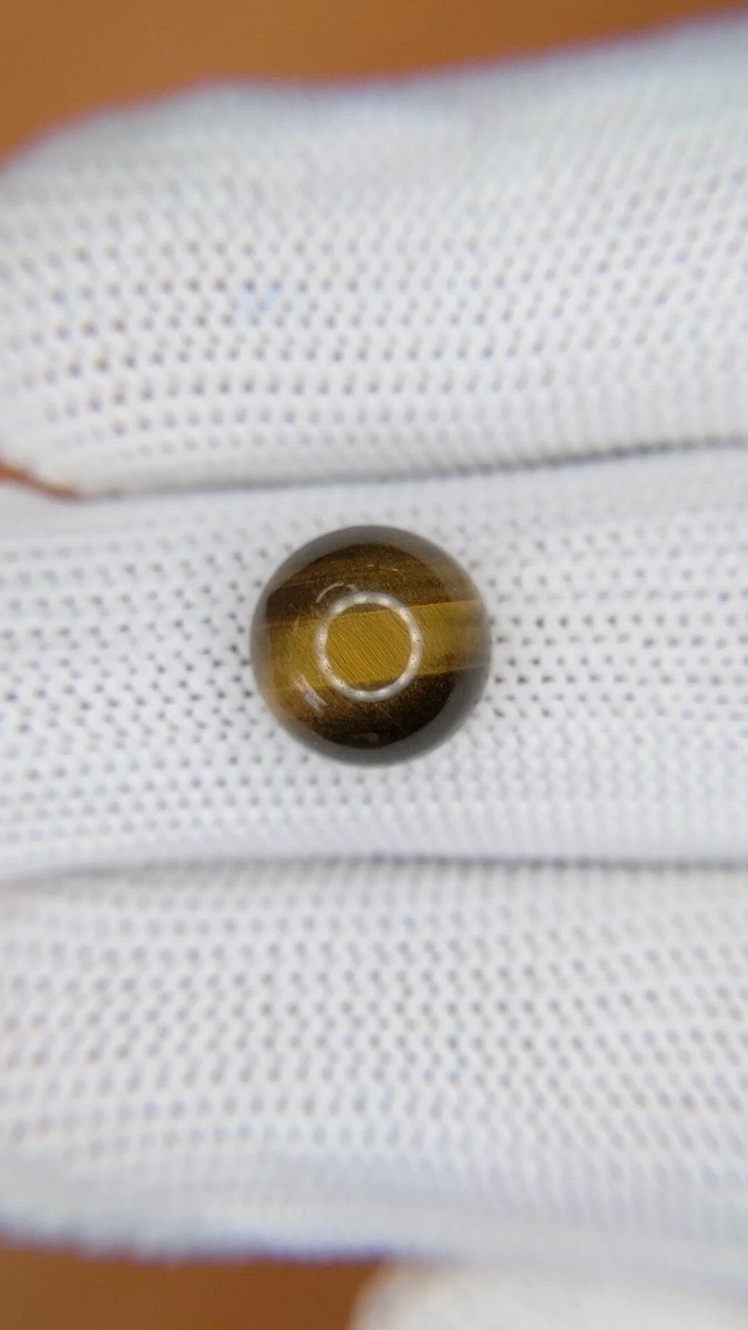 4.27 Ct. Cabochon Tiger's Eye from Ceylon (Sri Lanka) Size Video