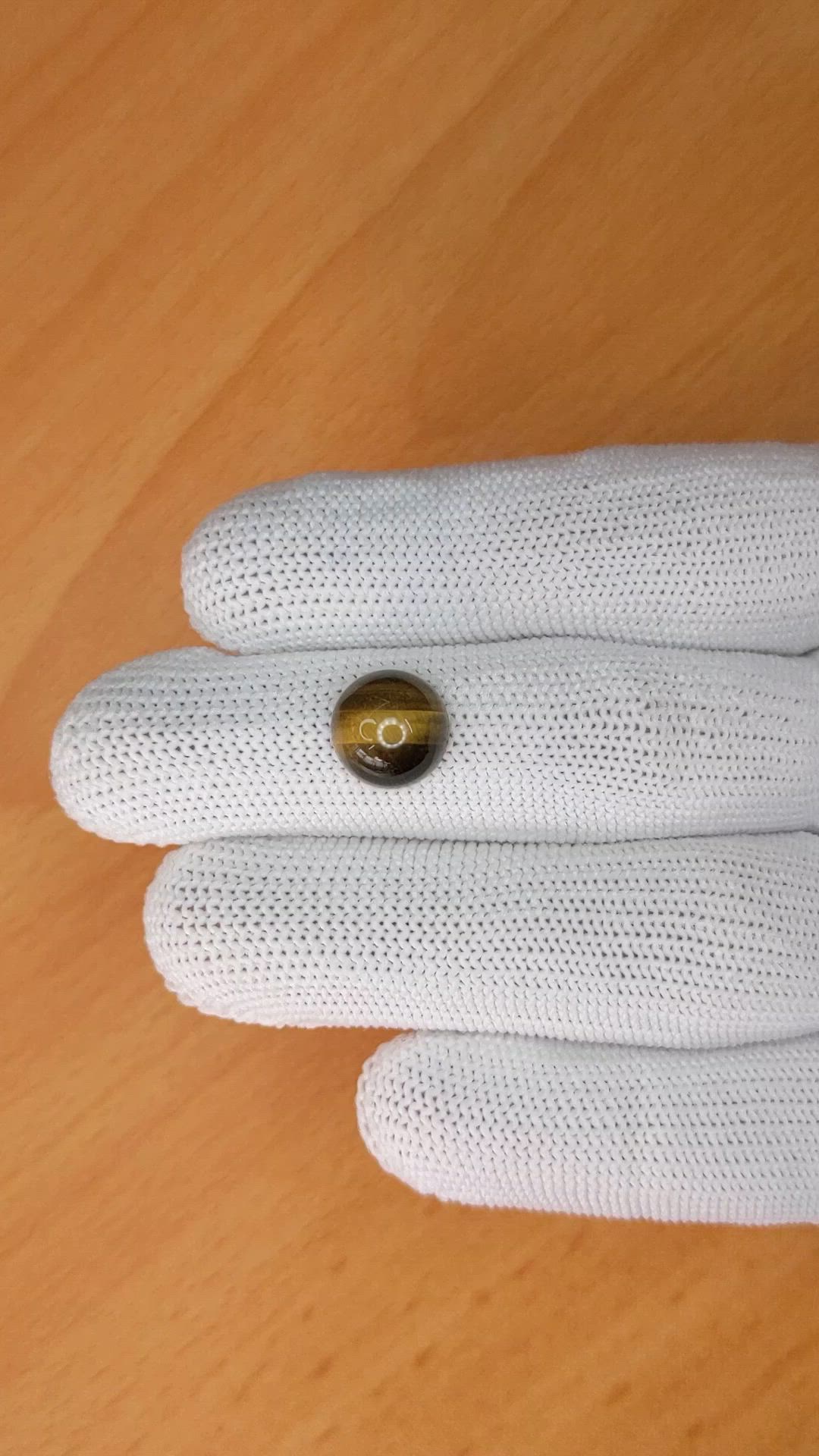 4.27 Ct. Cabochon Tiger's Eye from Ceylon (Sri Lanka) Size Video