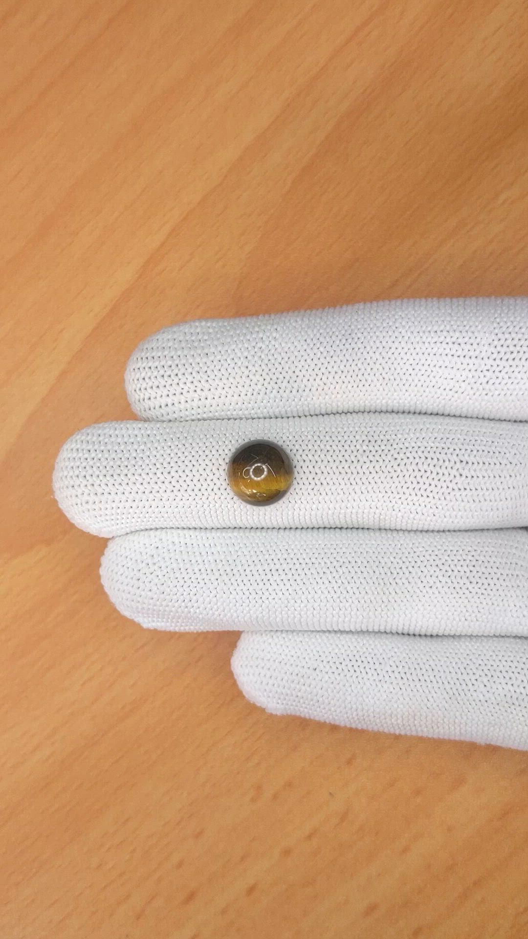 4.38 Ct. Cabochon Tiger's Eye from Ceylon (Sri Lanka) Size Video
