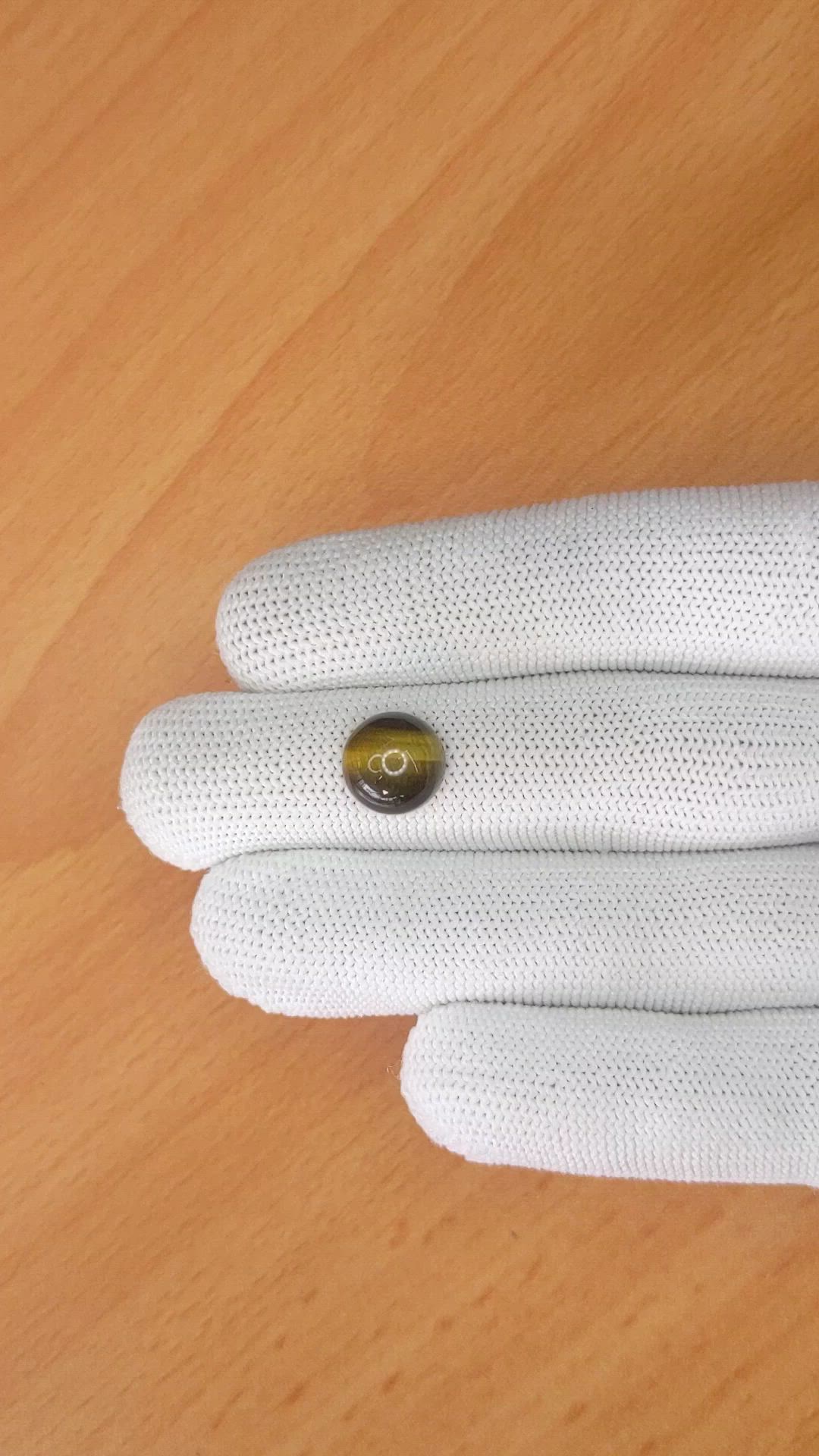4.31 Ct. Cabochon Tiger's Eye from Ceylon (Sri Lanka) Size Video