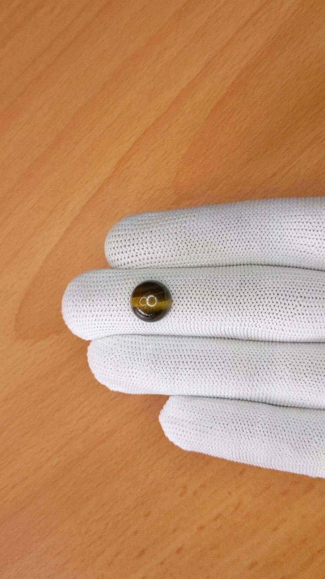 4.47 Ct. Cabochon Tiger's Eye from Ceylon (Sri Lanka) Size Video