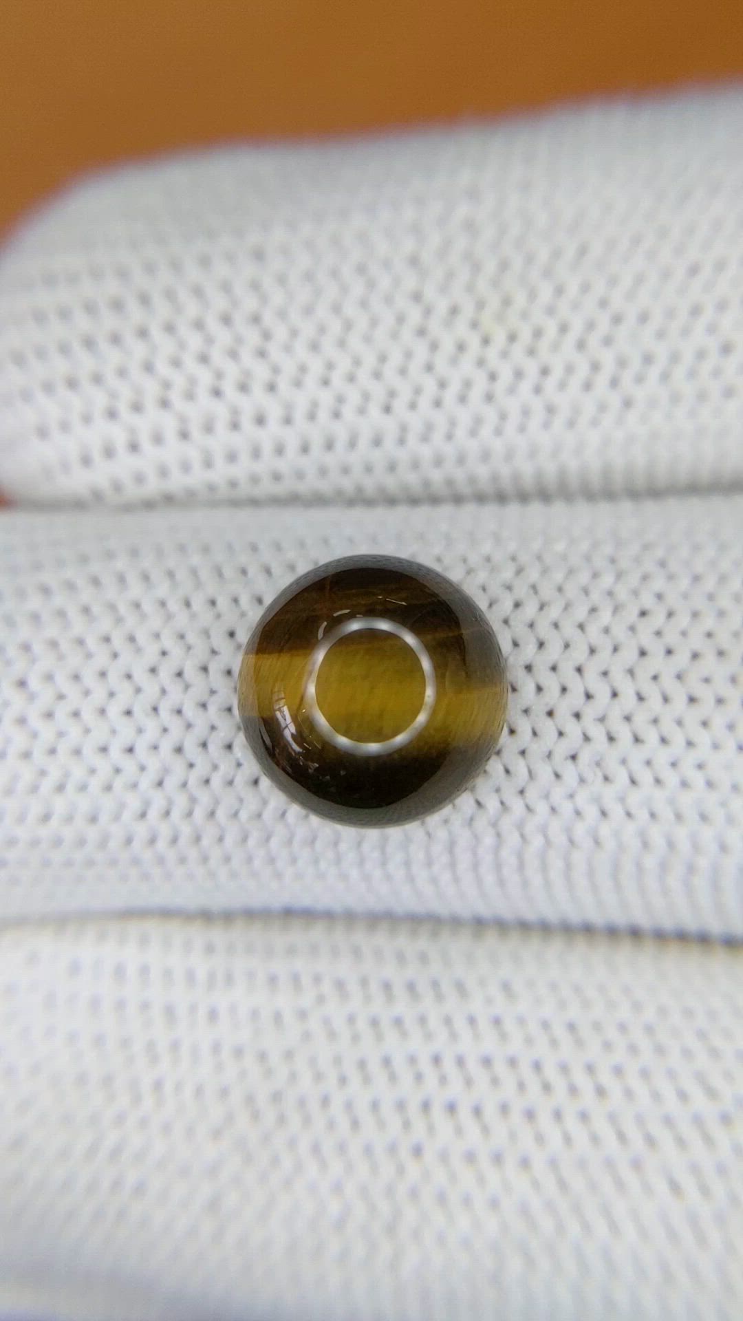 4.47 Ct. Cabochon Tiger's Eye from Ceylon (Sri Lanka) Size Video