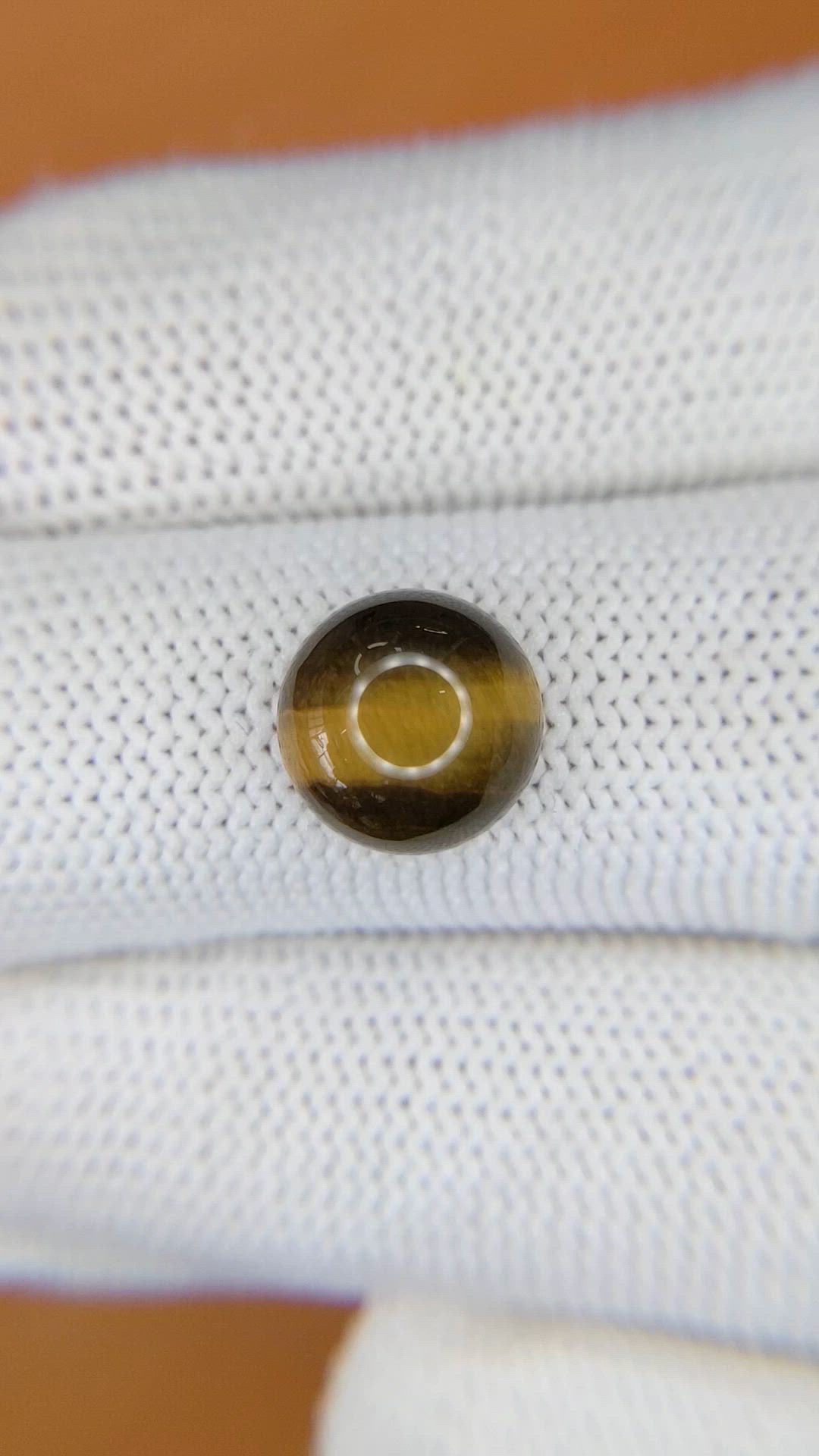 4.31 Ct. Cabochon Tiger's Eye from Ceylon (Sri Lanka) Size Video