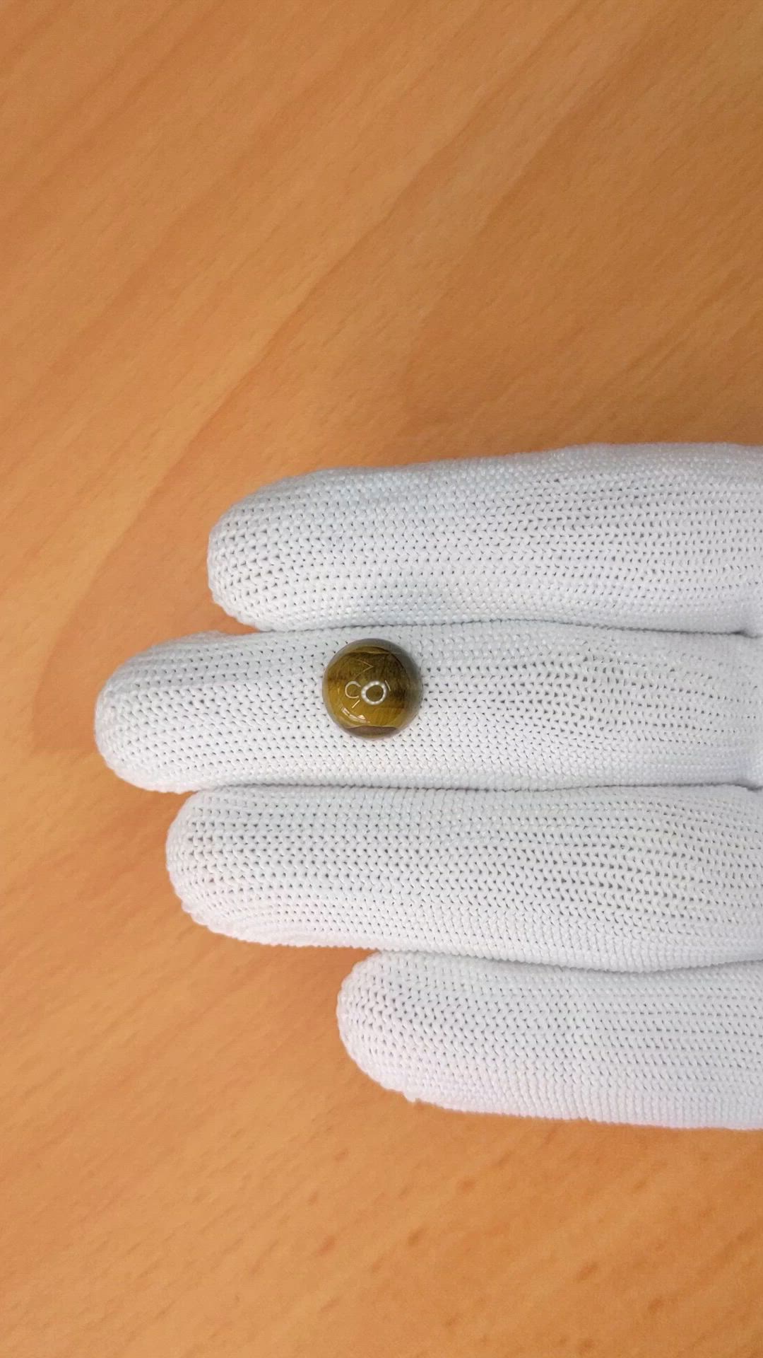 4.36 Ct. Cabochon Tiger's Eye from Ceylon (Sri Lanka) Size Video