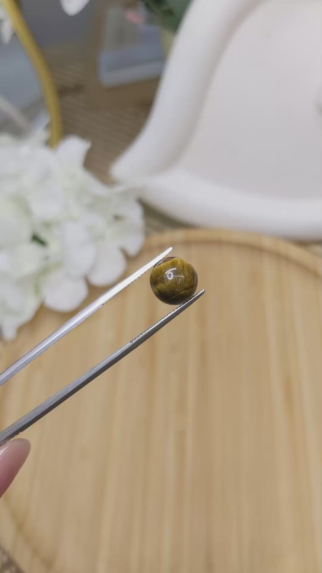 4.36 Ct. Cabochon Tiger's Eye from Ceylon (Sri Lanka) Size Video