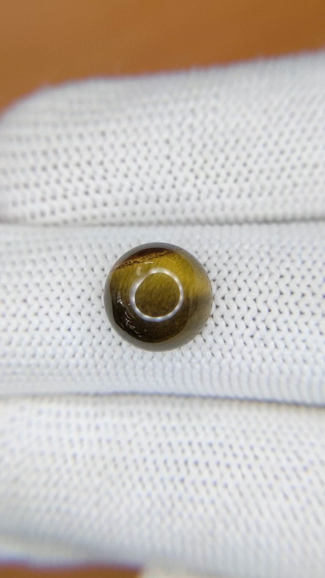 4.38 Ct. Cabochon Tiger's Eye from Ceylon (Sri Lanka) Size Video