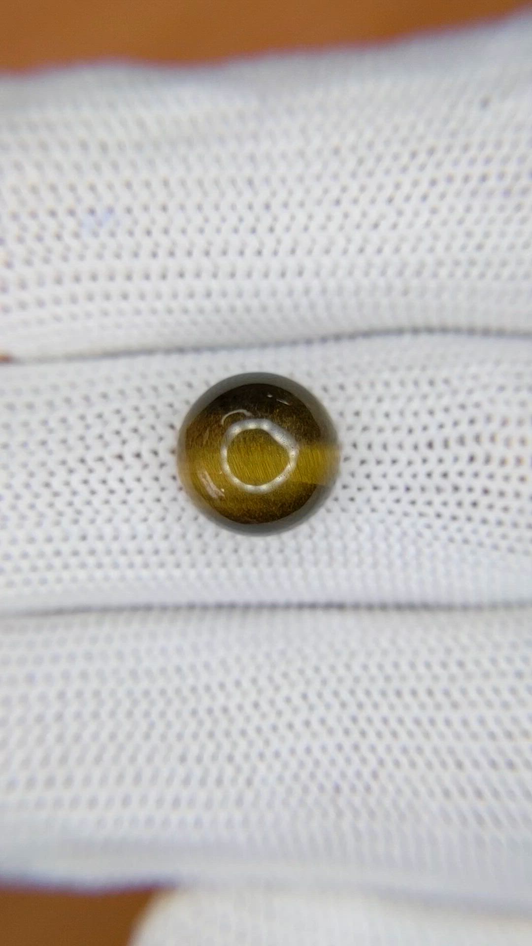 4.27 Ct. Cabochon Tiger's Eye from Ceylon (Sri Lanka) Size Video