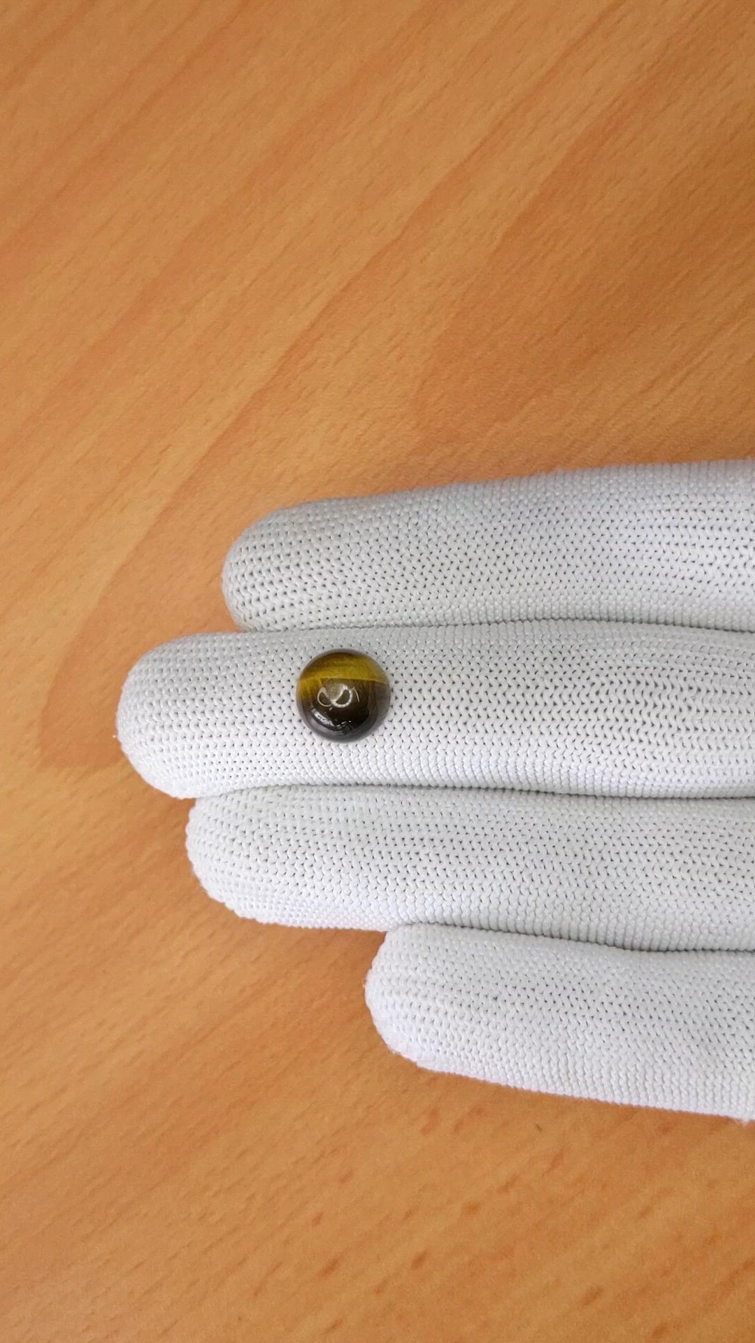 4.37 Ct. Cabochon Tiger's Eye from Ceylon (Sri Lanka) Size Video