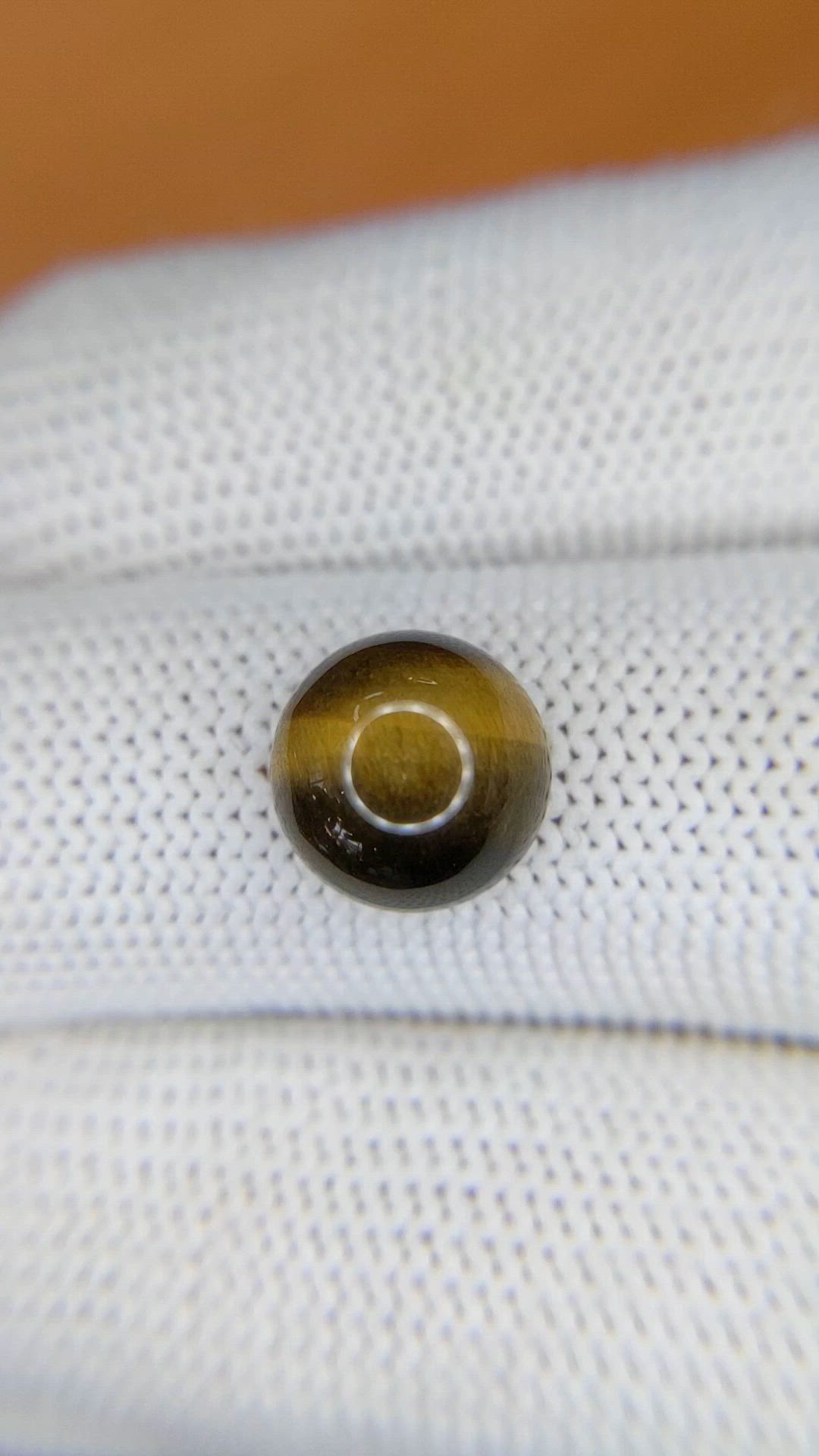 4.37 Ct. Cabochon Tiger's Eye from Ceylon (Sri Lanka) Size Video