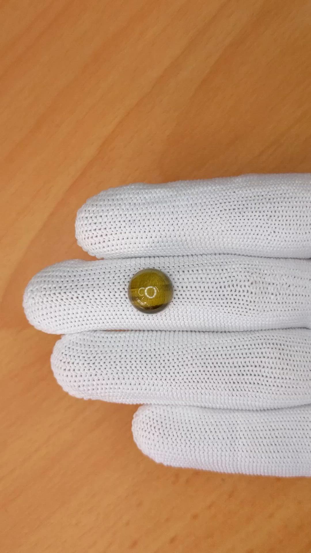 4.47 Ct. Cabochon Tiger's Eye from Ceylon (Sri Lanka) Size Video