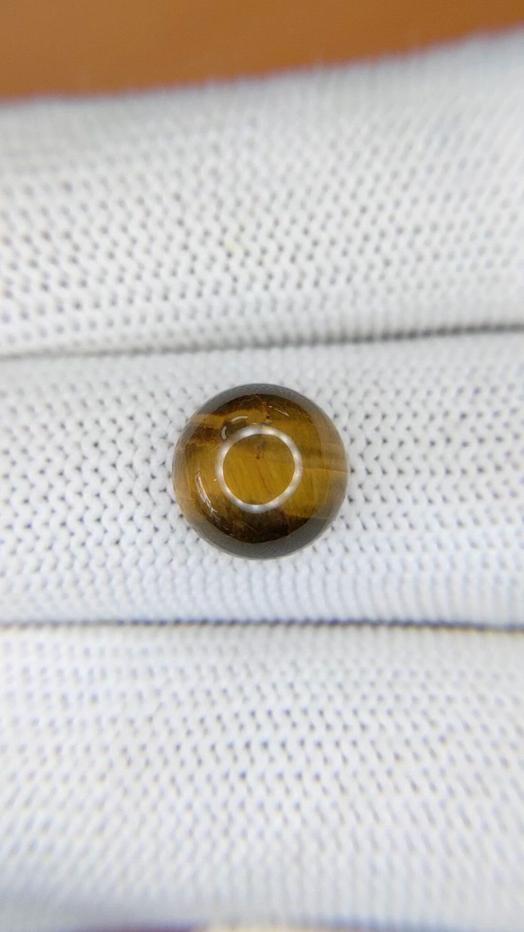 4.42 Ct. Cabochon Tiger's Eye from Ceylon (Sri Lanka) Size Video